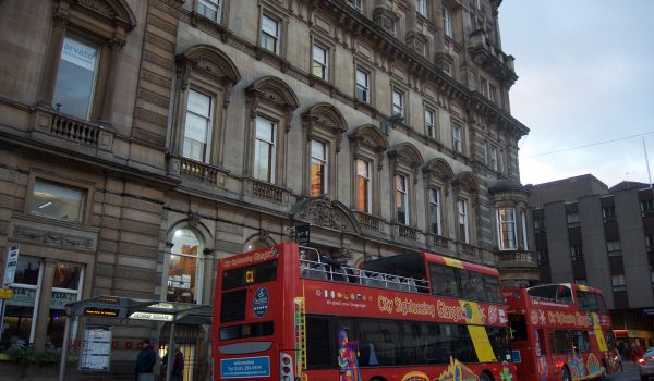 The Glasgow City Sightseeing Hop-on Hop-off bus tour in George Square